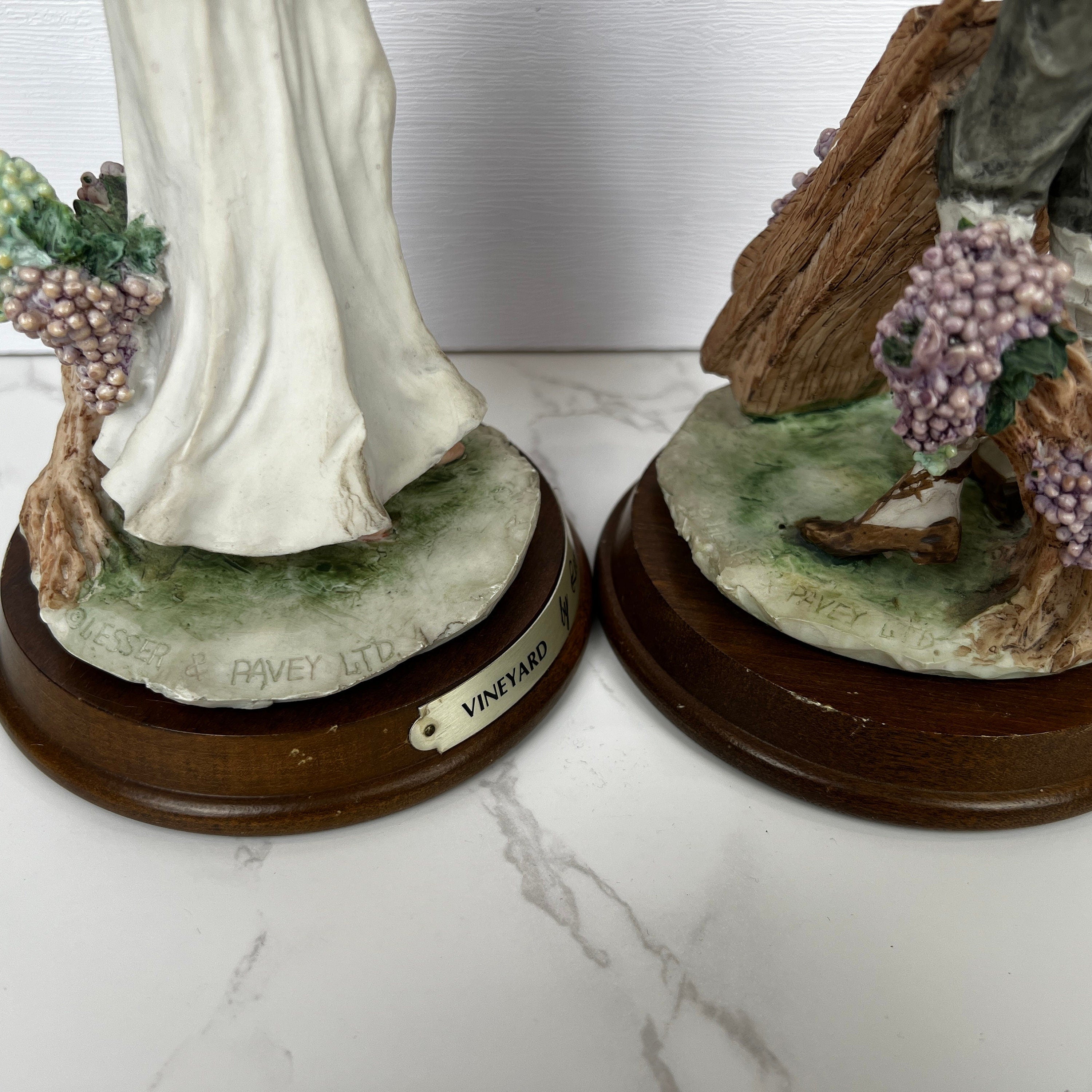 Leonardo Vineyard Pickers Figurines, Man and Woman Resin Statues