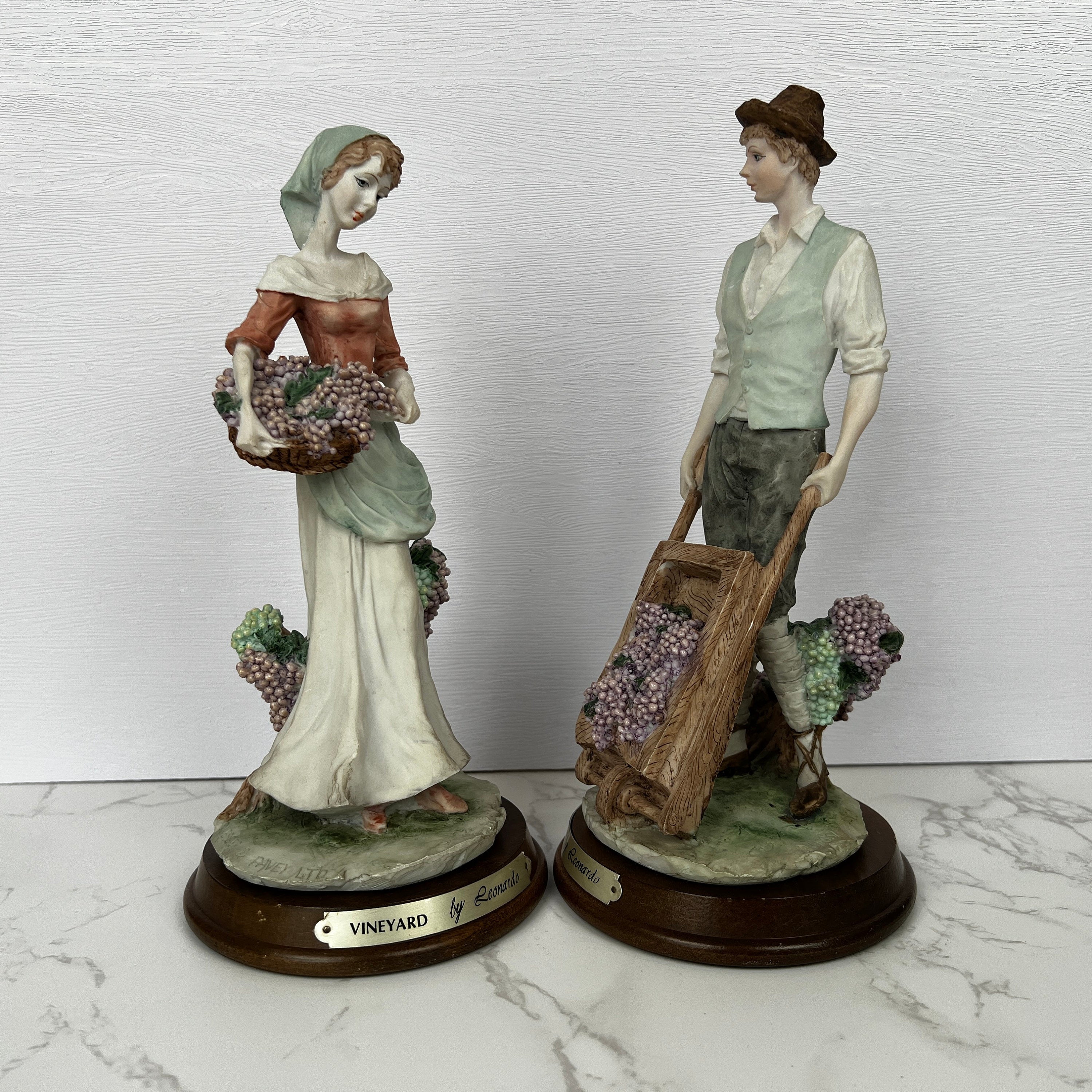 Leonardo Vineyard Pickers Figurines, Man and Woman Resin Statues