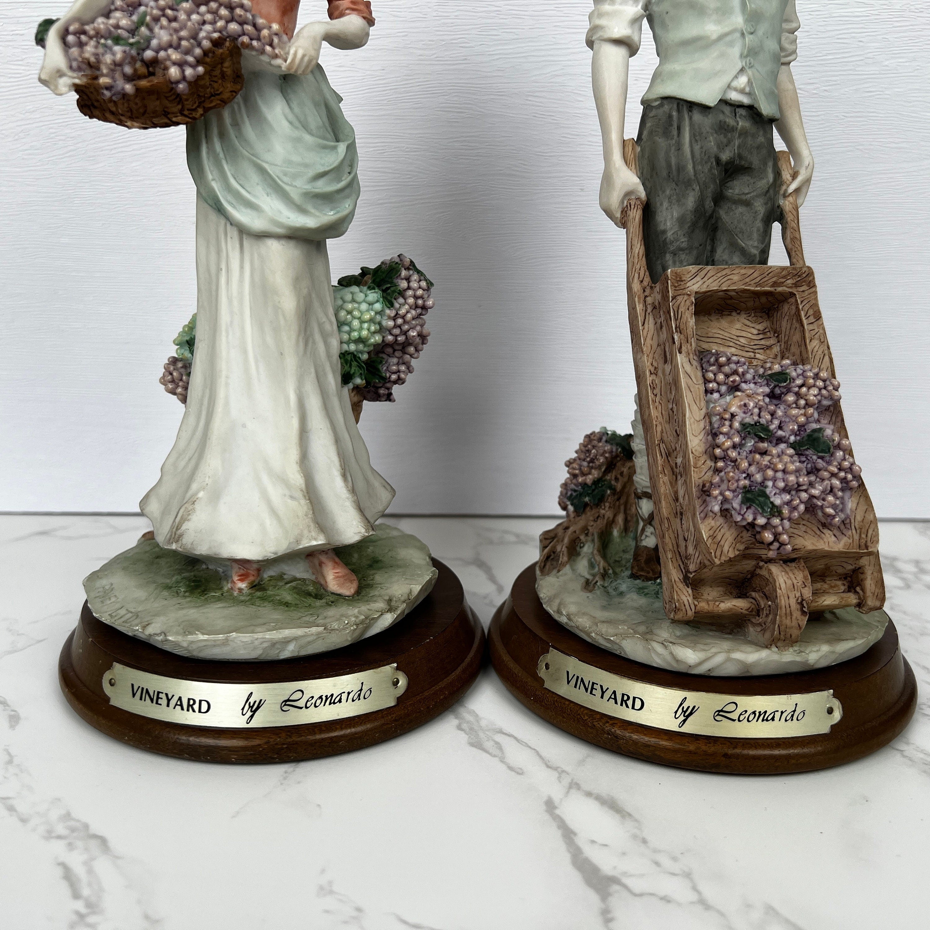 Leonardo Vineyard Pickers Figurines, Man and Woman Resin Statues