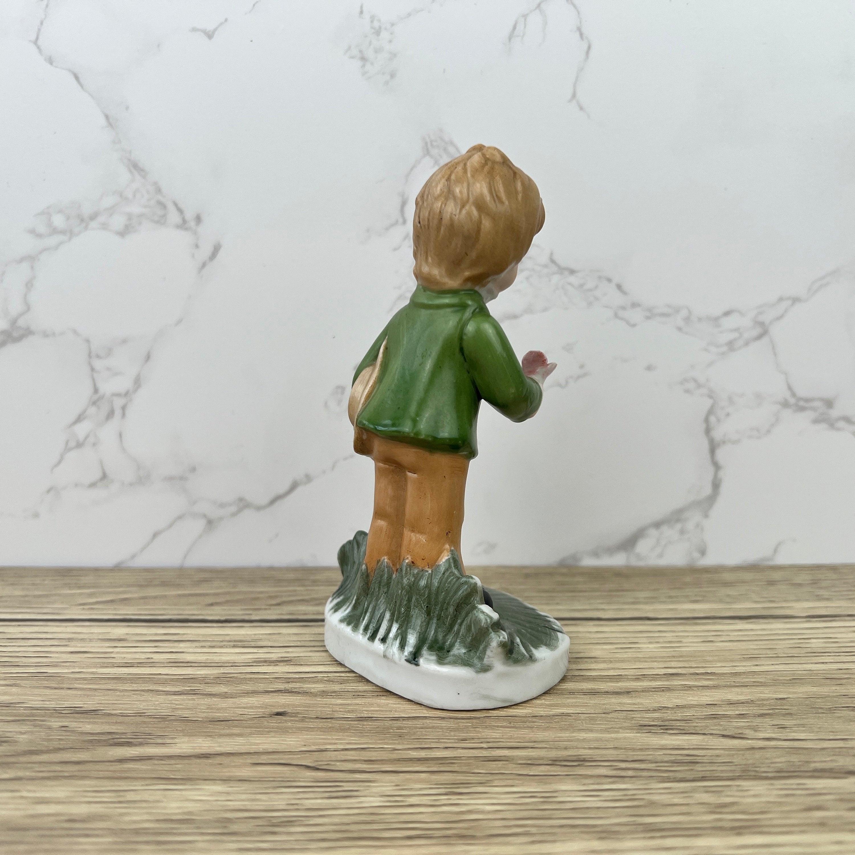 Alfretto Porcelain Boy Figurine with Flower, Handmade Crown Stamp