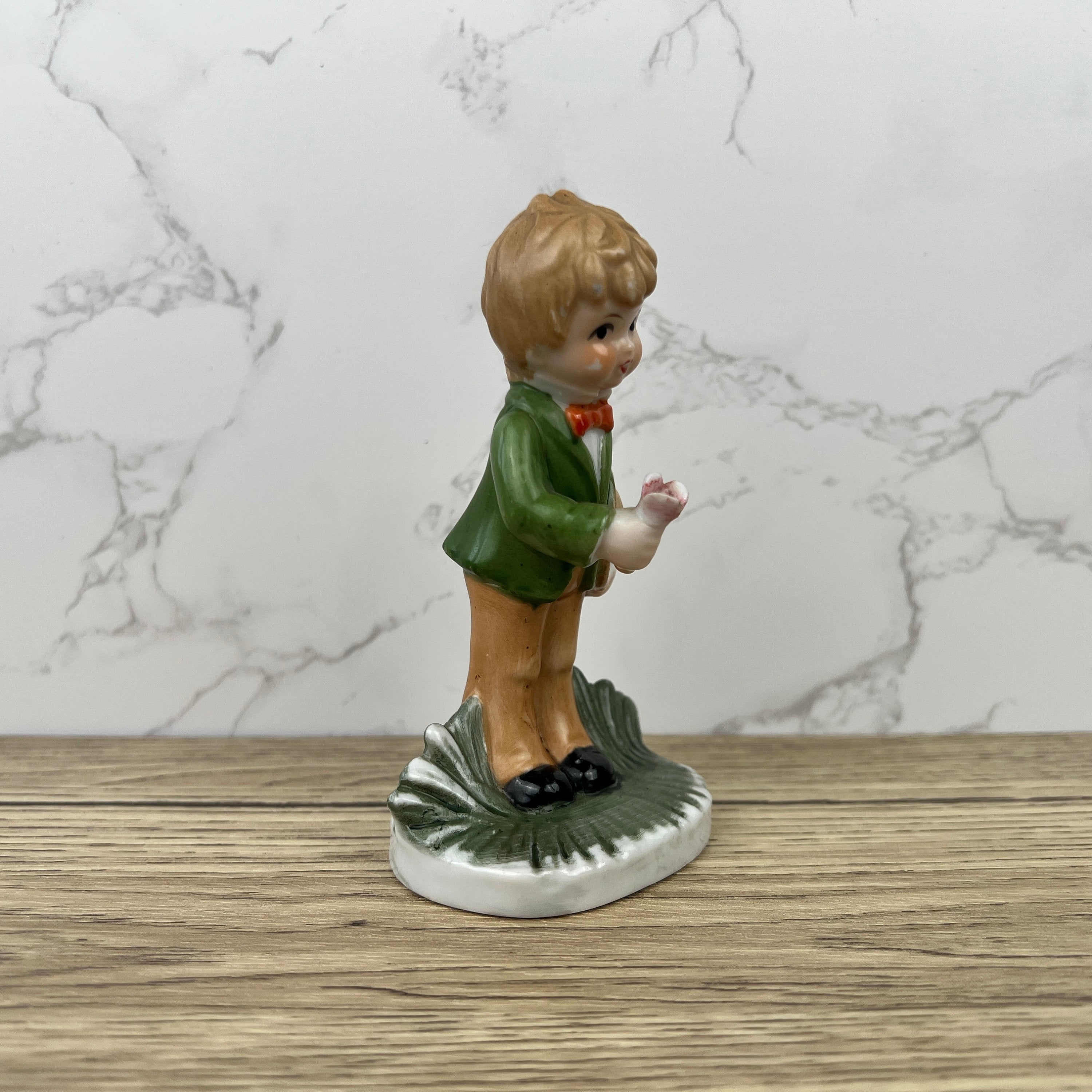 Alfretto Porcelain Boy Figurine with Flower, Handmade Crown Stamp