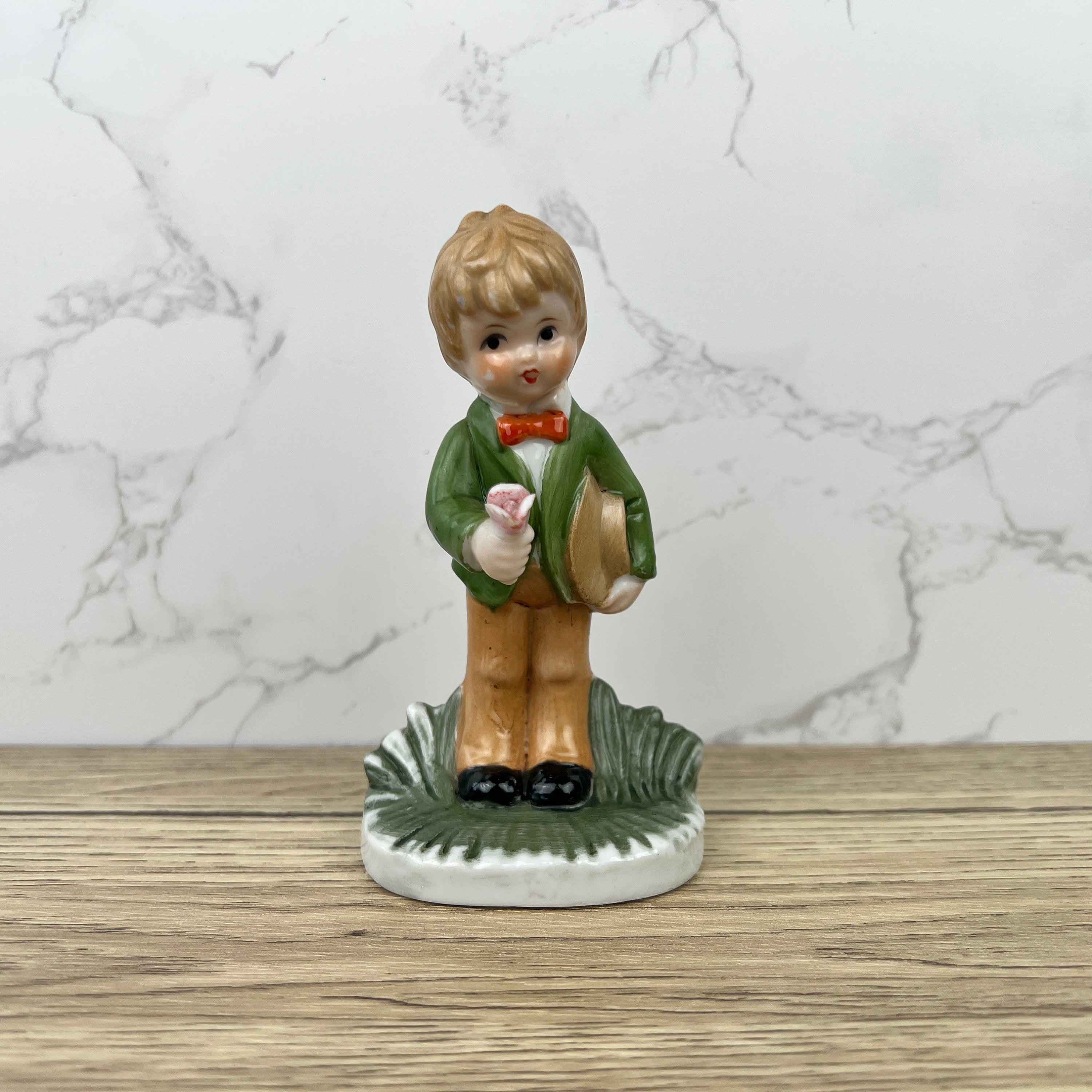 Alfretto Porcelain Boy Figurine with Flower, Handmade Crown Stamp
