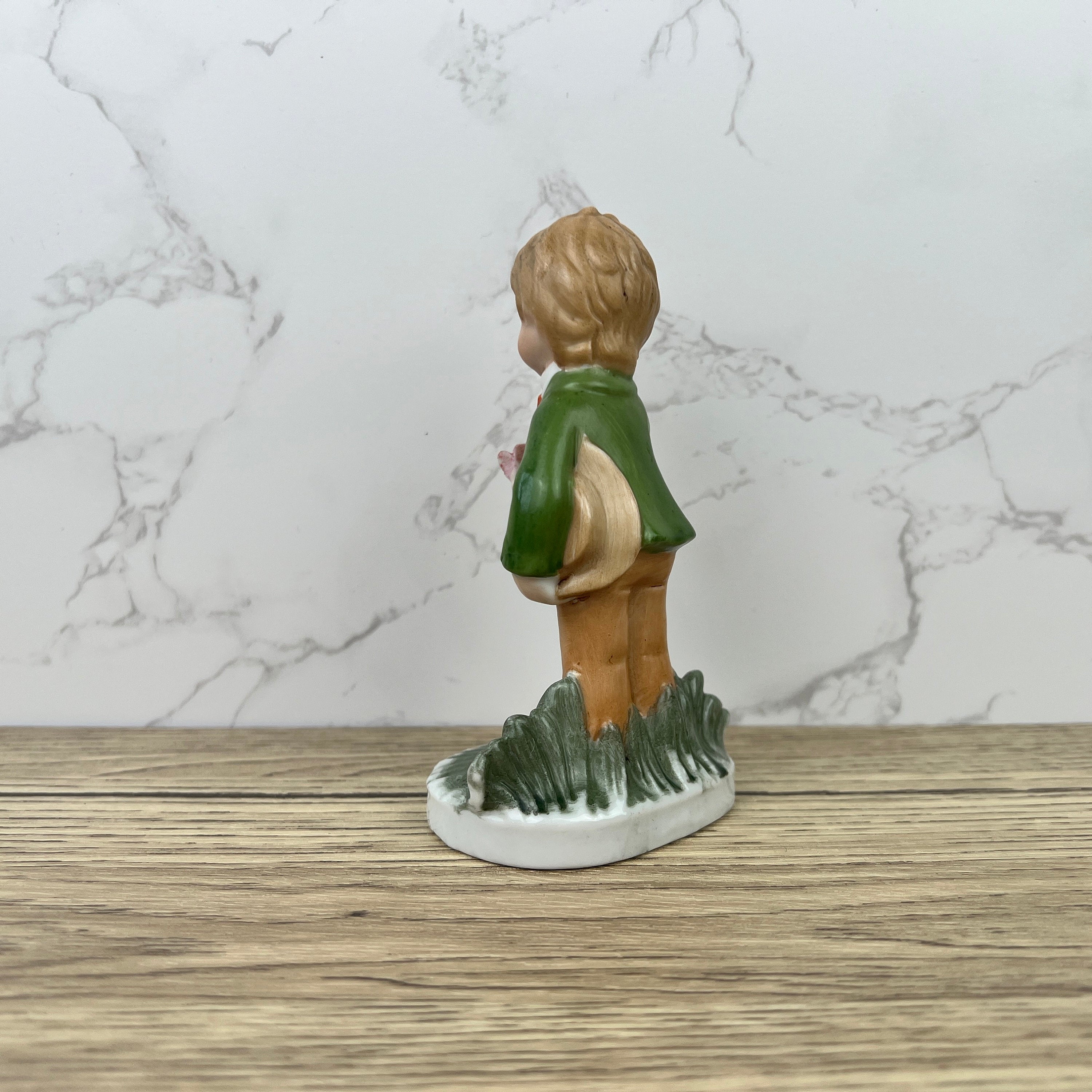 Alfretto Porcelain Boy Figurine with Flower, Handmade Crown Stamp