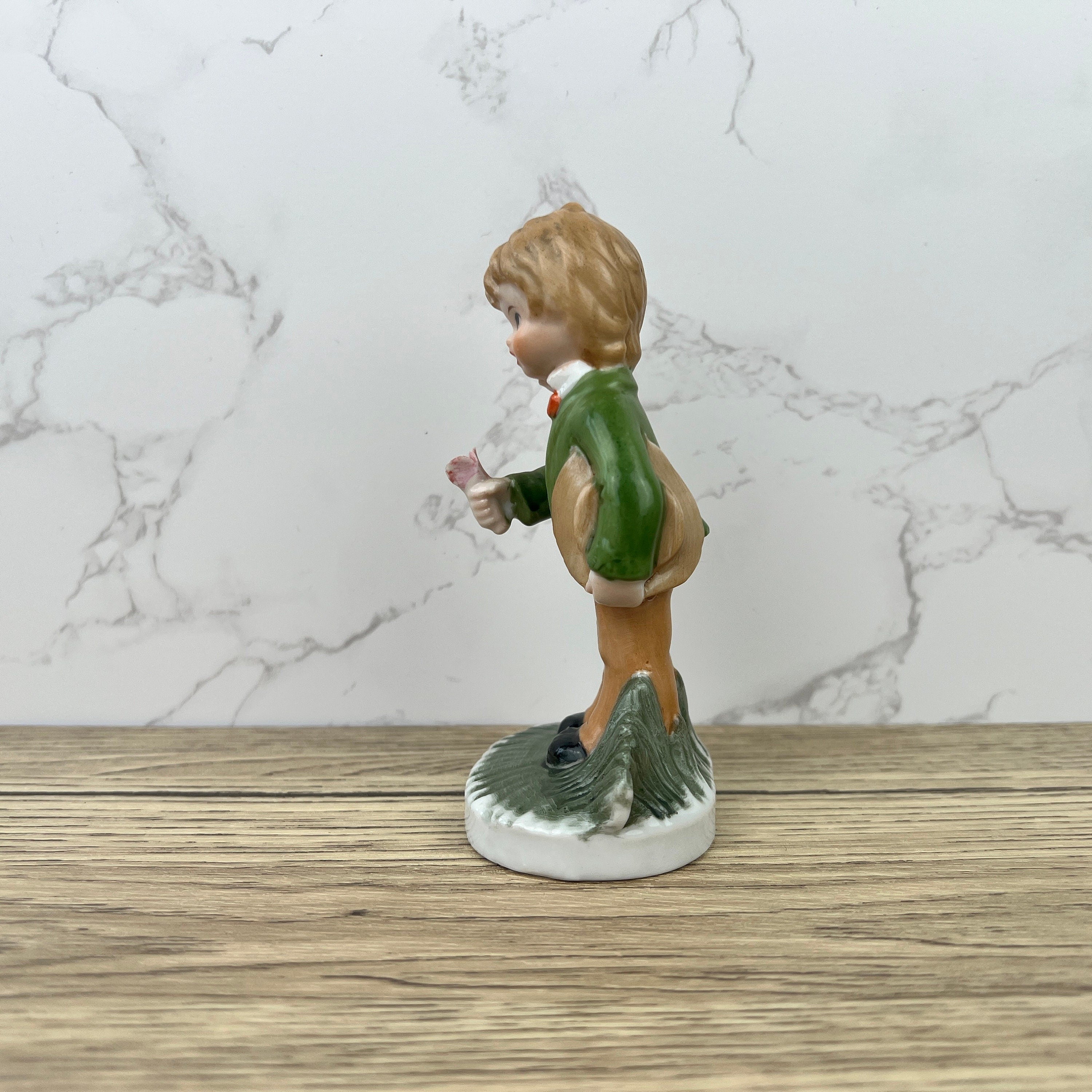 Alfretto Porcelain Boy Figurine with Flower, Handmade Crown Stamp