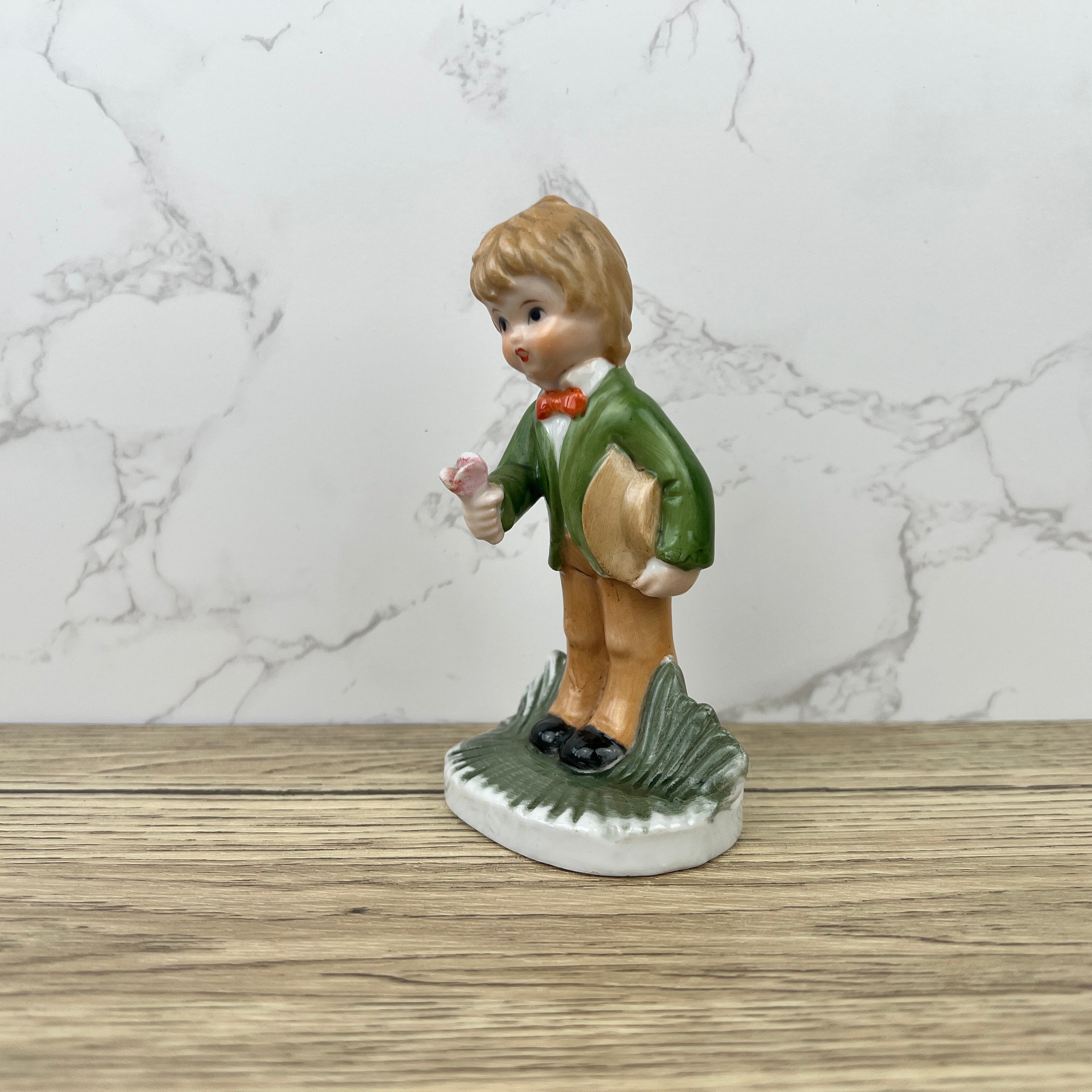 Alfretto Porcelain Boy Figurine with Flower, Handmade Crown Stamp