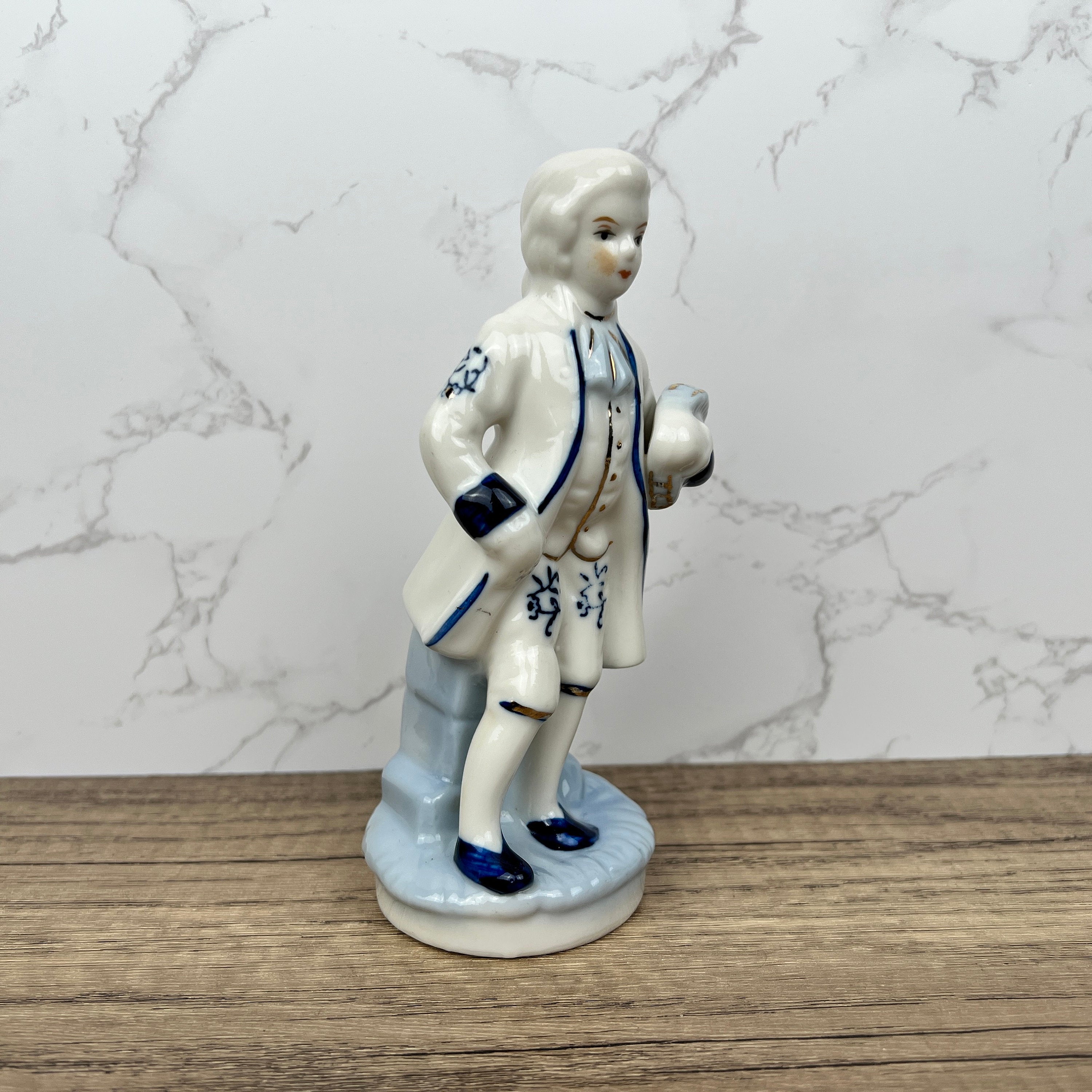 Vintage Porcelain Colonial Man Figurine, Blue and White Floral Decor