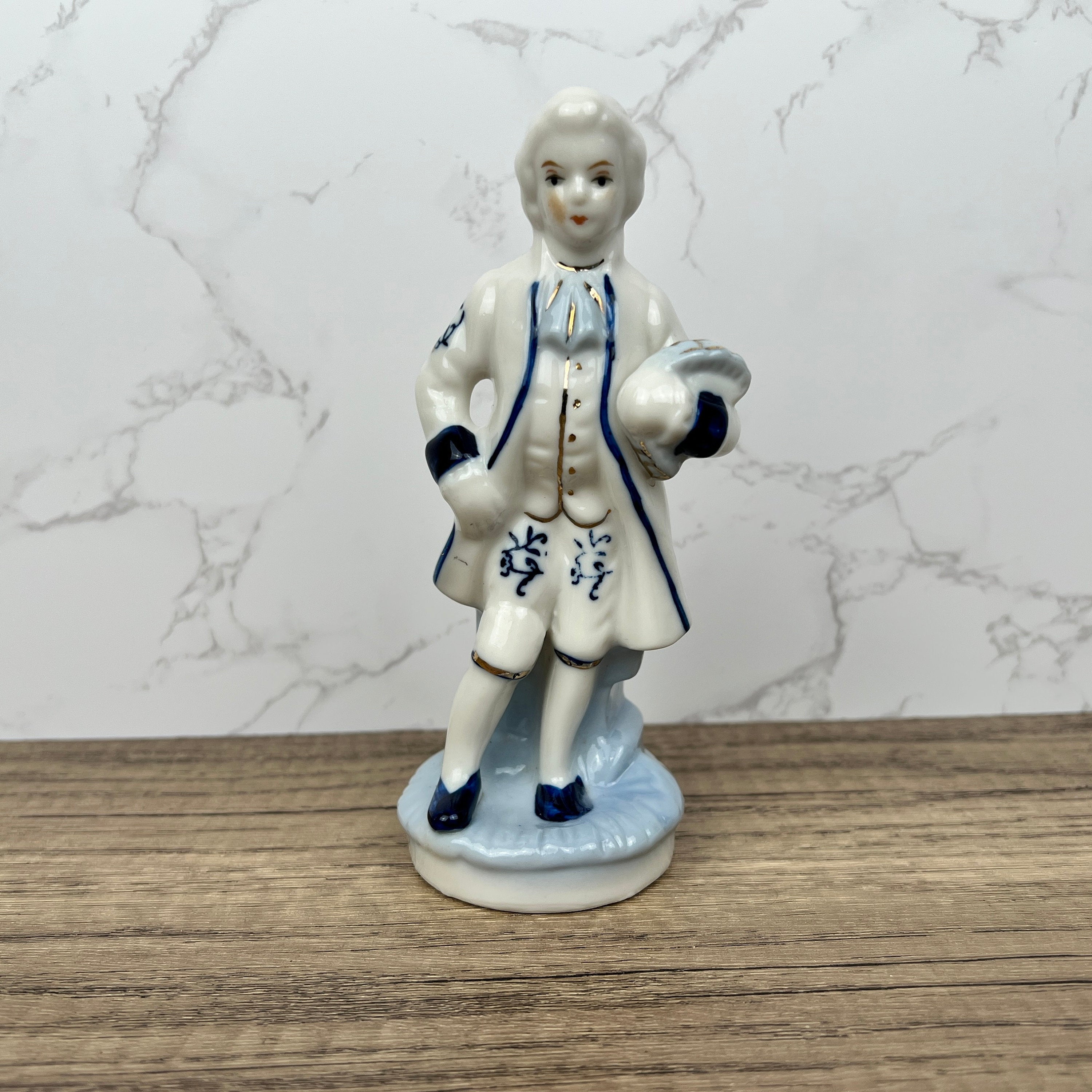 Vintage Porcelain Colonial Man Figurine, Blue and White Floral Decor