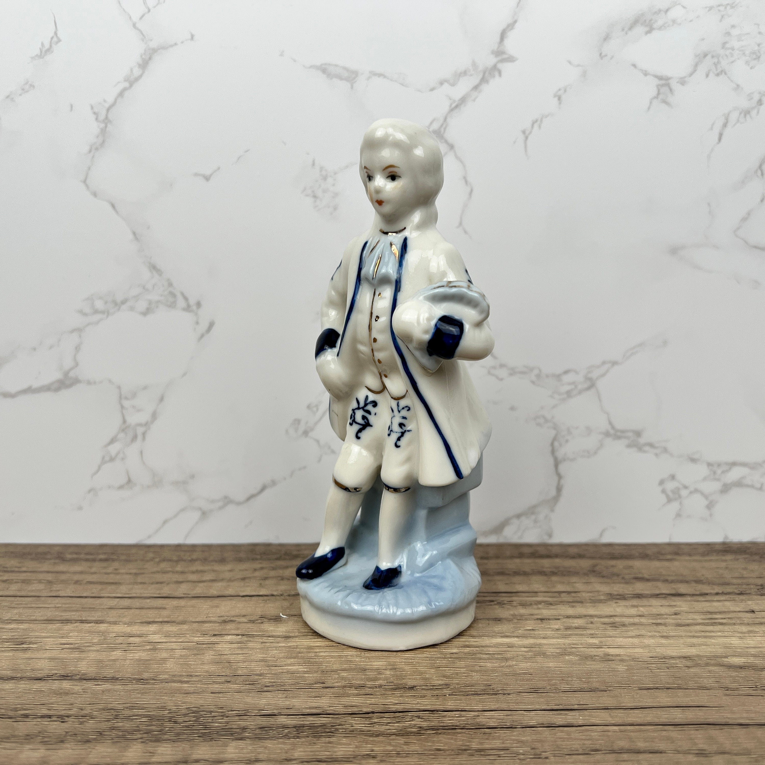 Vintage Porcelain Colonial Man Figurine, Blue and White Floral Decor
