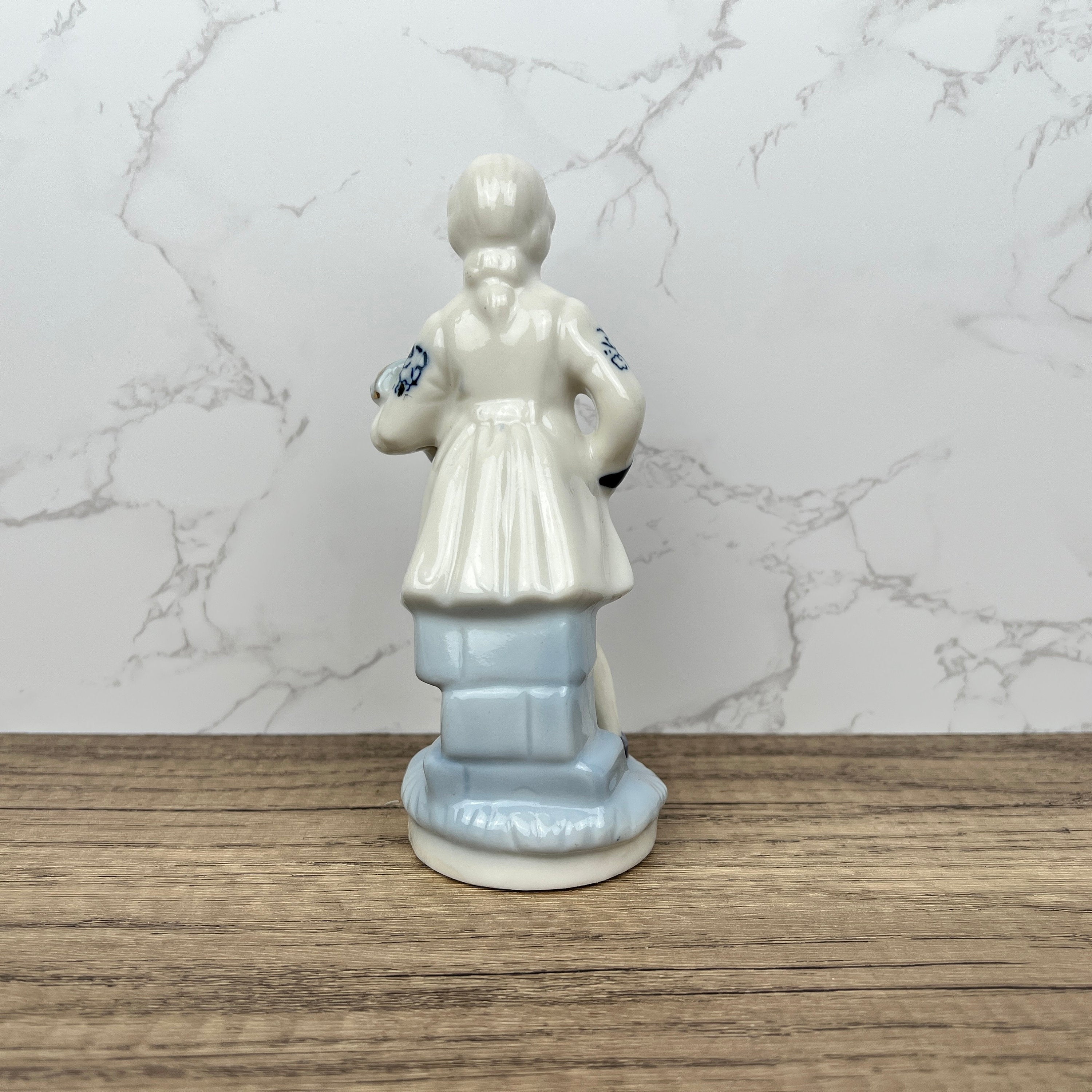 Vintage Porcelain Colonial Man Figurine, Blue and White Floral Decor