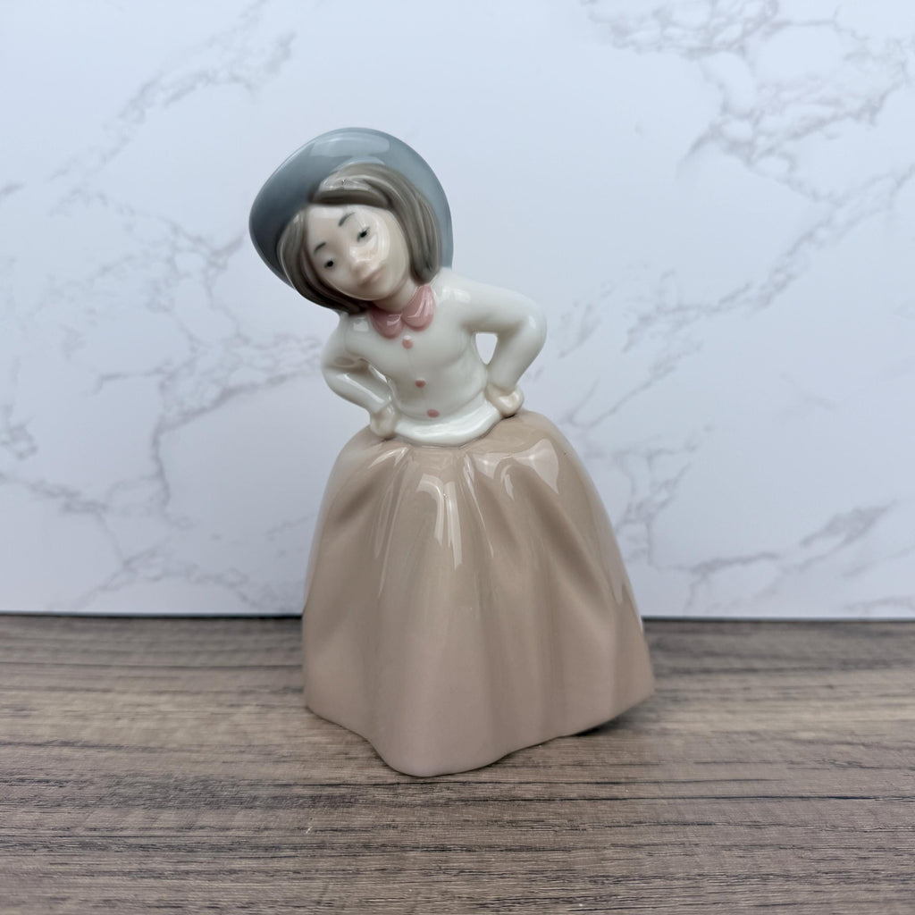 Retired Lladro Nao Porcelain “Inquisitive Girl” Figurine #1289