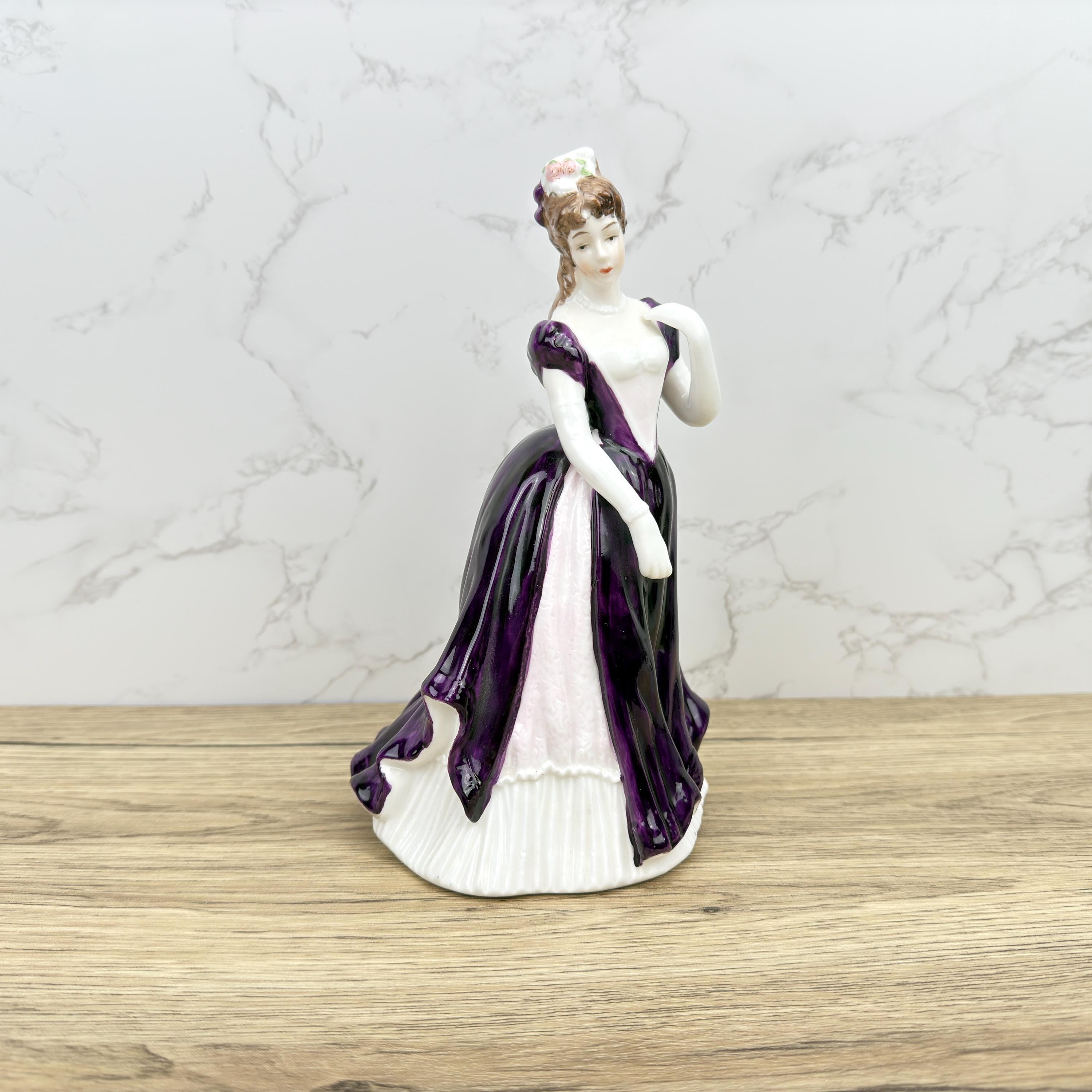 Leonardo Collection Porcelain Figurine, Lady in Purple Dress
