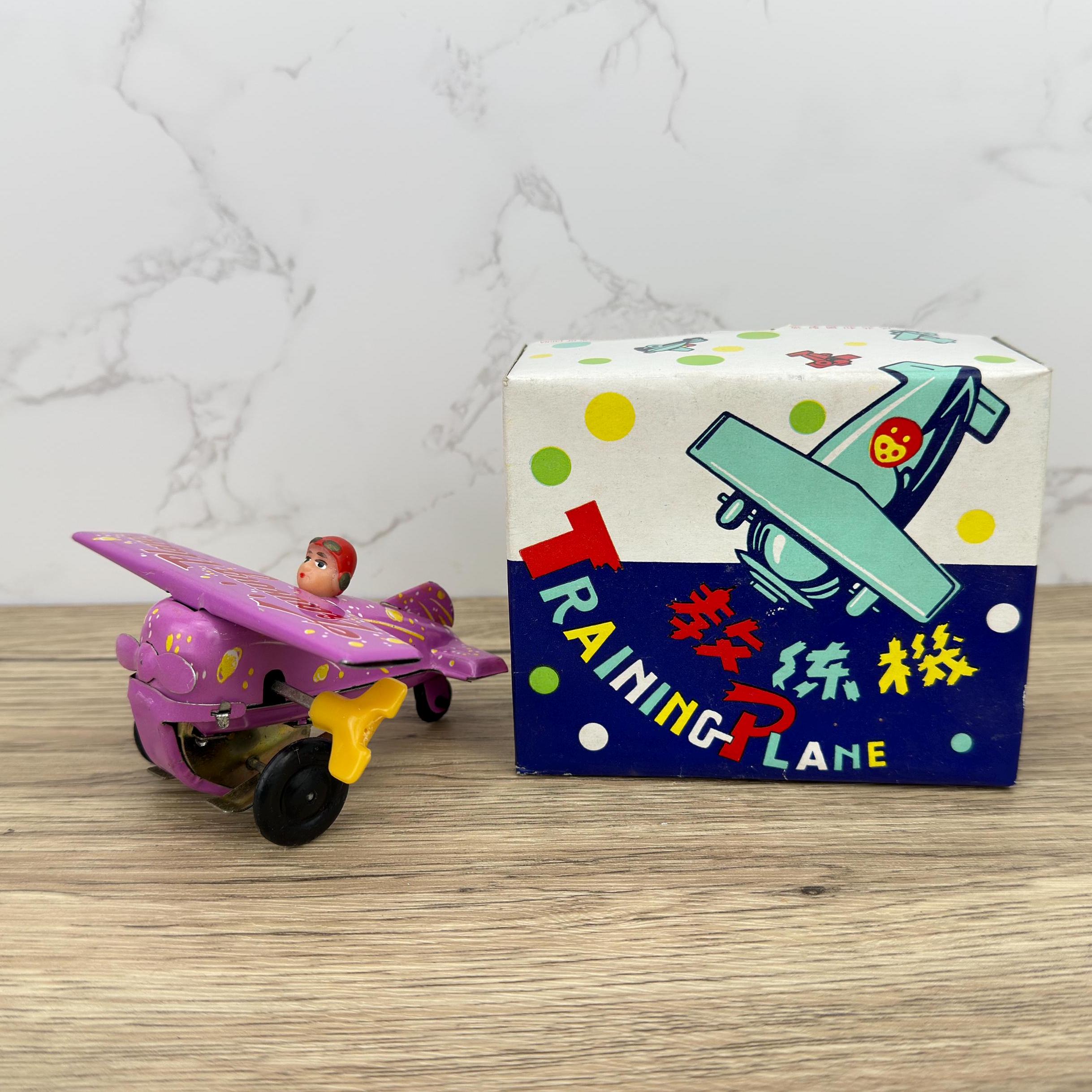 Vintage Pink Tin Training Plane Toy, Wind-Up Collectible
