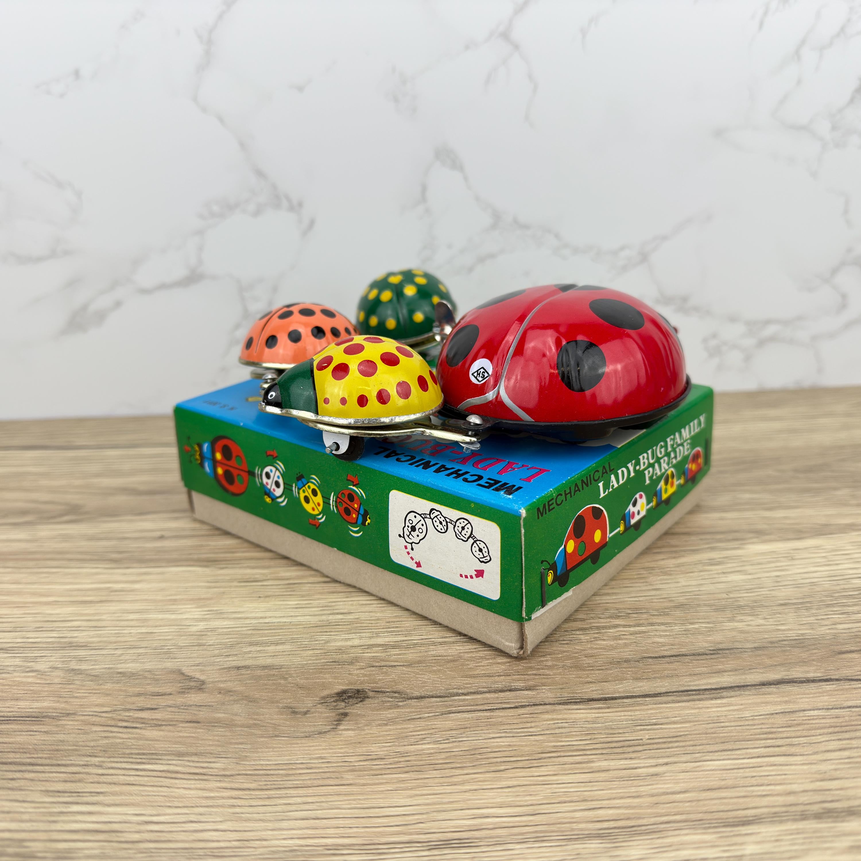 Vintage Tinplate Ladybug Family Parade Windup Toy, Collectible with Box