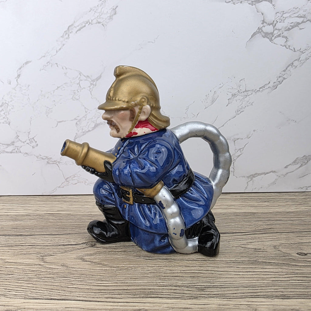 Vintage Leonardo Fireman Figurine with Hose | Decorative Ceramic Teapot Style Ornament | Collectible Sculpture