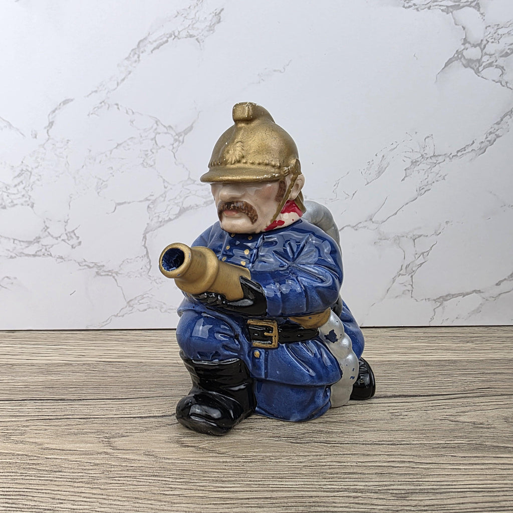 Vintage Leonardo Fireman Figurine with Hose | Decorative Ceramic Teapot Style Ornament | Collectible Sculpture